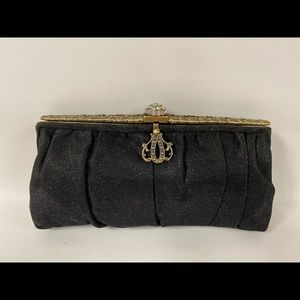 Black and gold detail clutch with chain handle